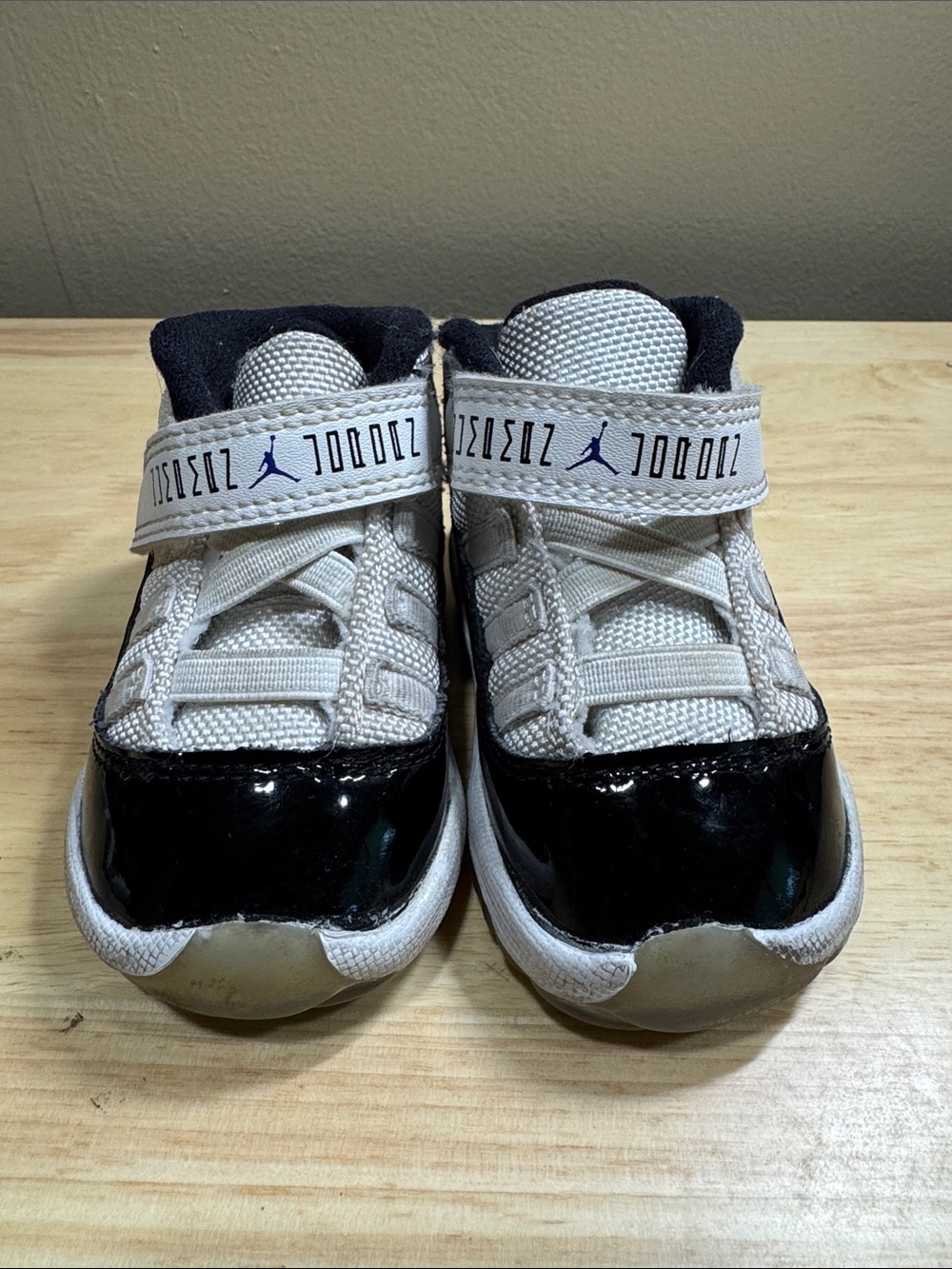 Air Jordan 11 high top toddlers Black & White Low-Top Sneakers with Strap